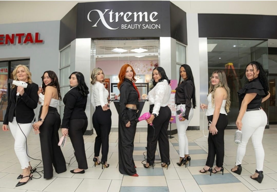 The Xtreme Beauty Salon team in front of the salon