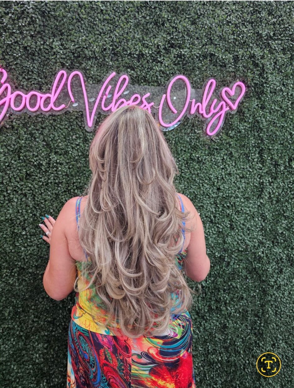 Long ash blonde layered hair